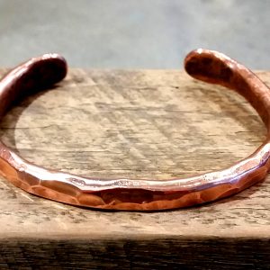 copper forge hammered narrow solid bangle front view